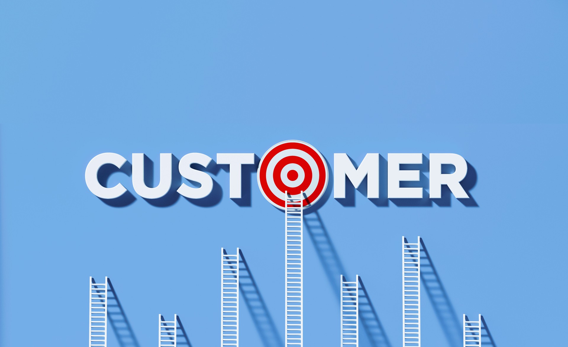 White Ladders Leaning on Customer Written Bull's Eye Target on Blue Wall